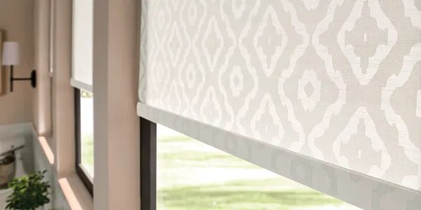 A close up of the window covering on a roller blind